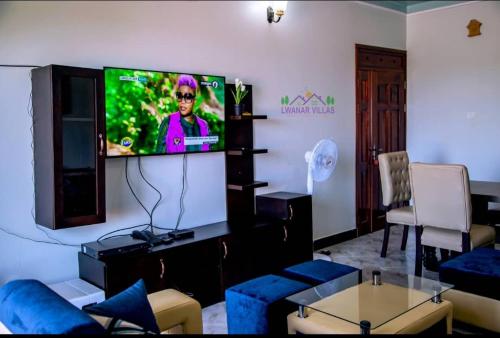 Televisor o centre d'entreteniment de Lwanar Villas and Apartments