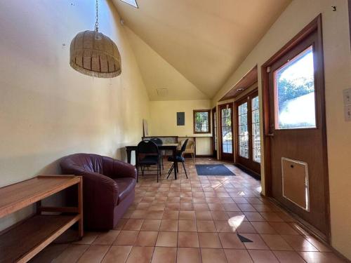 a living room with a couch and a table at Character house in North Dunbar in Vancouver