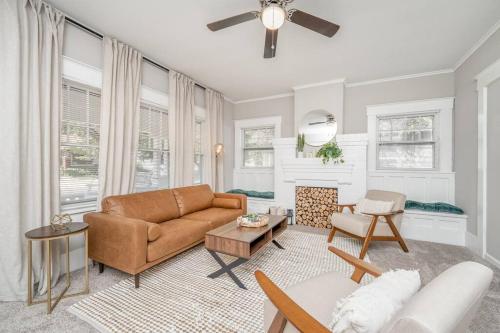 a living room with a couch and a table at 4 Bed 2 Bath Home by College Hill and Hospitals in Wichita