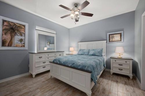 a bedroom with a bed and a ceiling fan at Luxury 3 Bed 2 Bath 2nd Floor Condo By Beach in South Padre Island