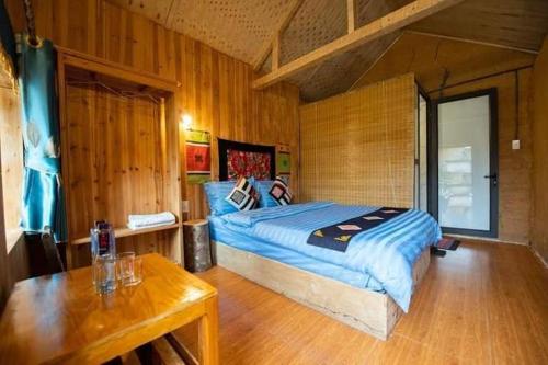 Katil atau katil-katil dalam bilik di Hong Thu Homestay & Bungalow