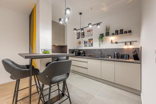 Η κουζίνα ή μικρή κουζίνα στο Condo With Balcony @ Downtown Budapest