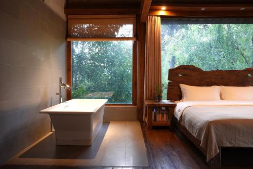 Ένα ή περισσότερα κρεβάτια σε δωμάτιο στο My love inn 吾爱堂
