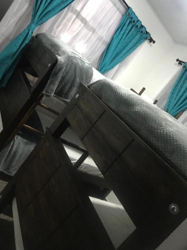 מיטה או מיטות בחדר ב-Casas campestres Romegar