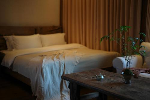 Ένα ή περισσότερα κρεβάτια σε δωμάτιο στο My love inn 吾爱堂