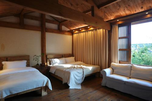 Ένα ή περισσότερα κρεβάτια σε δωμάτιο στο My love inn 吾爱堂