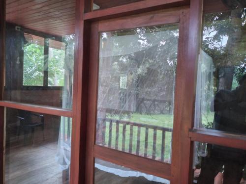 Балкон или терраса в Green Herbal Ayurvedic Eco-Chalets