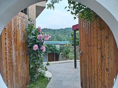 Zahrada ubytování Chunjian Guesthouse