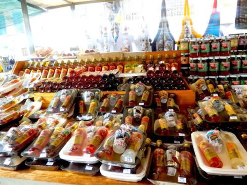 a store filled with lots of bottles of alcohol at Nr41 Holiday Apartment - Close to Village Centre, Promenade, Shops & Restaurants in Marsaxlokk