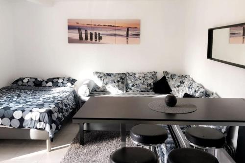 Postel nebo postele na pokoji v ubytování Studios moderne et spacieux