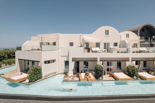 a rendering of a villa with a swimming pool at West East Suites in Imerovigli