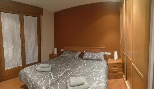 Ένα ή περισσότερα κρεβάτια σε δωμάτιο στο Apartamento Carlos Bielsa