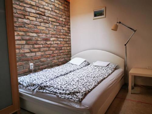 Ліжко або ліжка в номері Liget Apartman Fonyódliget - Balaton lake view 30 m from Beach.