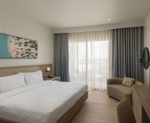 Postel nebo postele na pokoji v ubytování Hilton Garden Inn La Romana