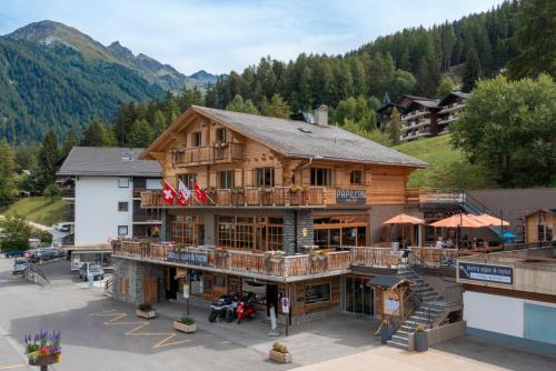 an overhead view of a lodge in the mountains at PAPILL'ON - Boutique Hotel in La Tzoumaz