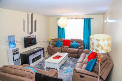 Kuchyň nebo kuchyňský kout v ubytování Jacky's Milimani suites