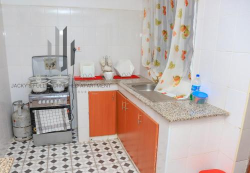 Kuchyň nebo kuchyňský kout v ubytování Jacky's Milimani suites