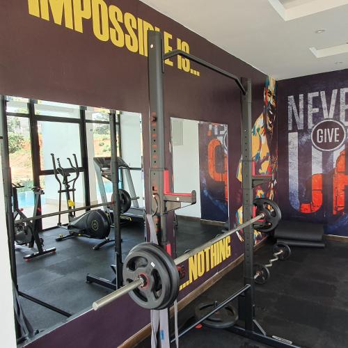 Gimnasio o instalaciones de fitness de Intercultural Apartment Nairobi Two Rivers