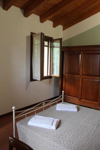 Una cama o camas en una habitación de La Rizza