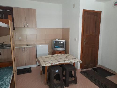 Kuchyň nebo kuchyňský kout v ubytování Apartman Osmancevic