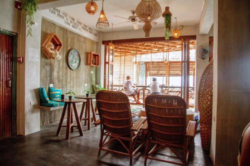 Zona de estar de Happiness Hostel El Nido