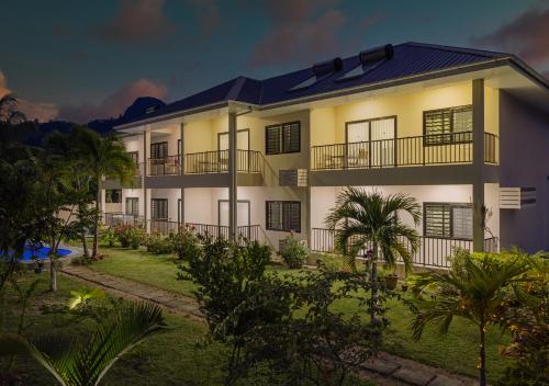 a rendering of a building at night at Creole Breeze Self Catering Apartments in Mahe