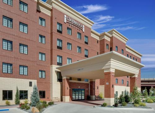 a rendering of the front of a red brick building at Staybridge Suites - Oklahoma City - Downtown by IHG in Oklahoma City