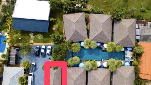 an overhead view of a parking lot with a pool at Seava House Ao-Nang Krabi in Ao Nang Beach