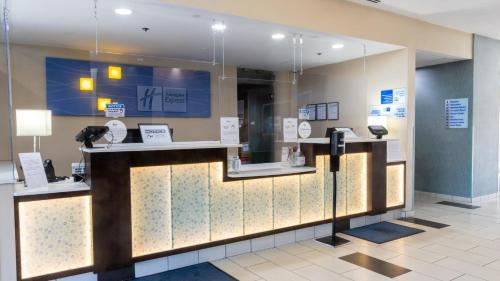 a lobby of a hospital with a reception counter at Holiday Inn Express Boise Downtown by IHG in Boise