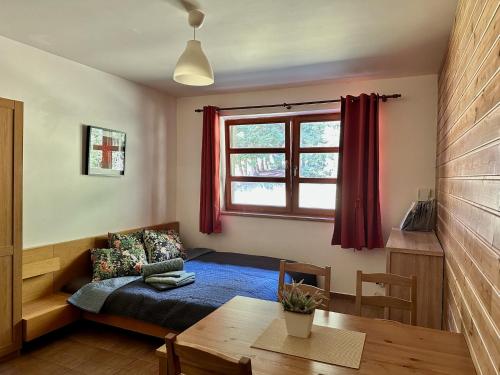 Posezení v ubytování Cihlářka - Vysokohorský apartmán 208