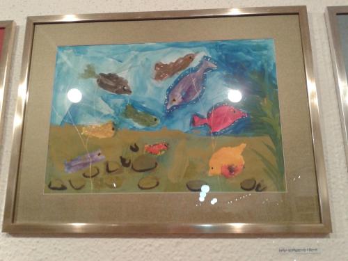 a picture of a painting of fish and shoes at Guest House Nise in Tbilisi City