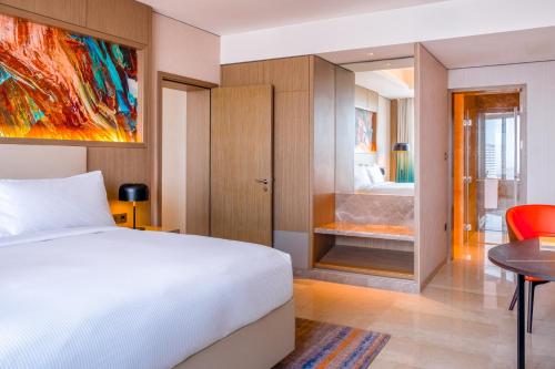 Una cama o camas en una habitación de Hilton Kinshasa