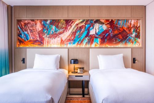 Una cama o camas en una habitación de Hilton Kinshasa