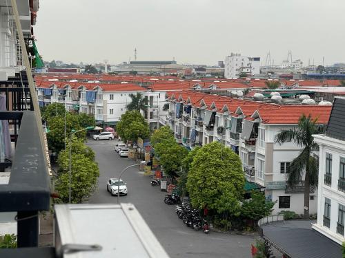 an aerial view of a city street with buildings at Basic Guest House Hải Phòng in Hai Phong