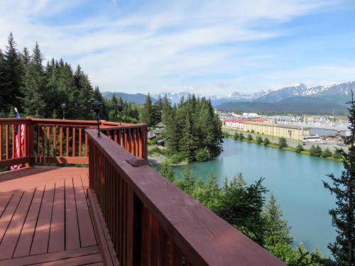 a view of a river from a wooden bridge at A Cabin on the Cliff in Seward