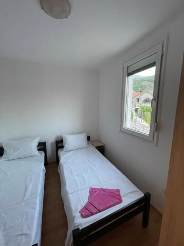 Postel nebo postele na pokoji v ubytování Najd apartment