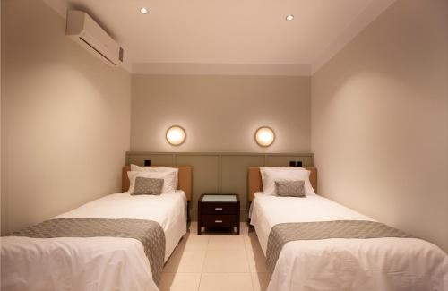 เตียงในห้องที่ VILLA JOSEPH