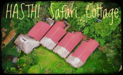 an overhead view of a house with pink roofs at Hasthi Safari Cottage in Udawalawe