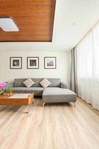 a living room with a couch and a table at Mila Hotel in Kathmandu