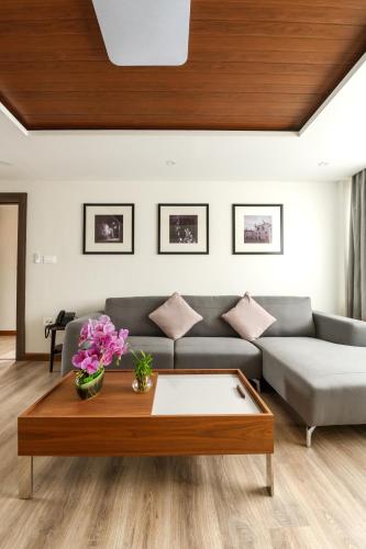 a living room with a couch and a coffee table at Mila Hotel in Kathmandu