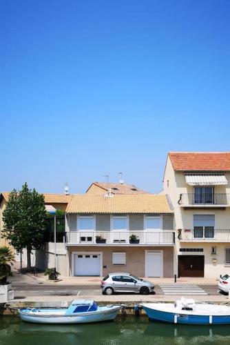 Jolie appartement avec terrasse, vue sur canal, à 2min de la plage