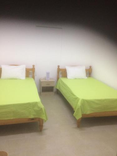 Ένα ή περισσότερα κρεβάτια σε δωμάτιο στο Auberge des Capucines