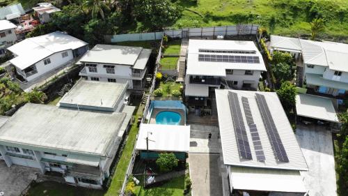 an aerial view of a group of houses at Spacious 4-bdrm fully self-contained WIFI, Parking in Suva