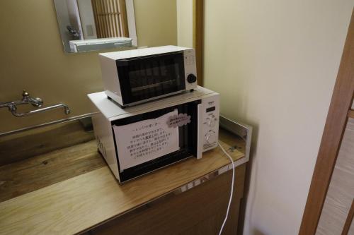 Fotografie z fotogalerie ubytování 貸切温泉風呂付 ゲストハウス璃洛-りらく- 石和温泉 日本式宿 健康朝食付 v destinaci Isawa