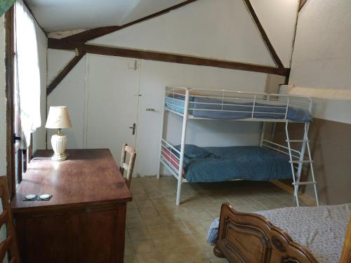 Poschodová posteľ alebo postele v izbe v ubytovaní Gîte de la Venerie Indre 36