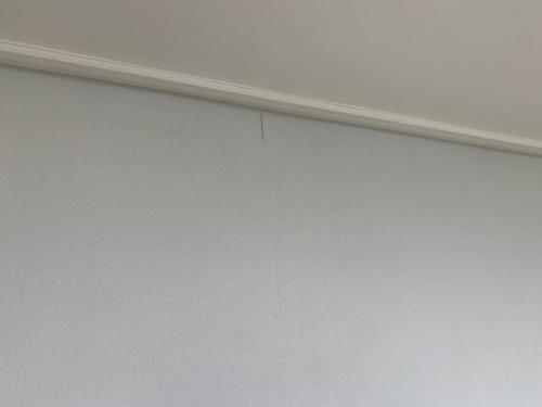 a room with a white wall and a ledge at Nice cozy apartment in Pyeongtaek