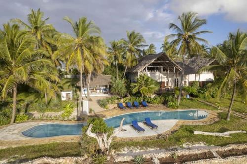 an aerial view of a resort with a swimming pool at Dar Beach House in Michamvi