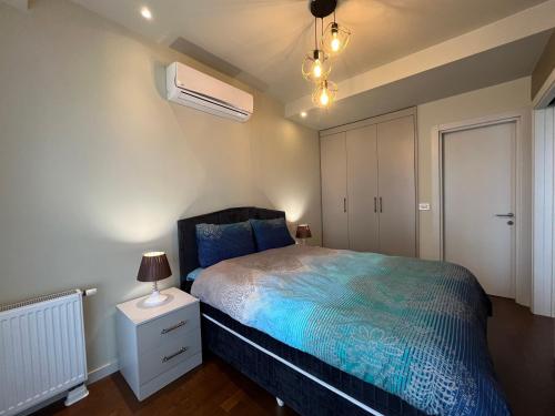 Säng eller sängar i ett rum på Ultra Luxury Residence