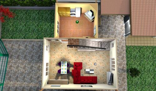 un modelo de casa con puerta roja en Villa con giardino privato, tre camere, due bagni, en Manerba del Garda
