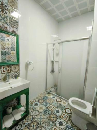 Ένα μπάνιο στο MAVİ PALAS HOTEL